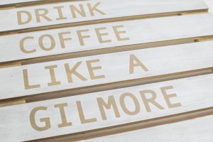 Decorate your coffee bar with Gilmore-inspired artwork using your Silhouette machine and a FREE SVG file to make the Gilmore Girls Coffee Sign.
