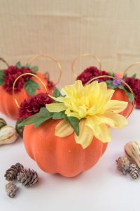 Floral Mickey Ears pumpkin - I hate spending money on pumpkins that mold quickly and make a mess when you carve them. So I'm switching to a simple + cheap version, styrofoam pumpkins from the Dollar Tree, to make my very own Floral Mickey Ears pumpkin!