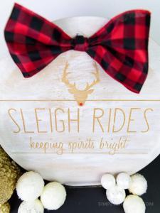 Rae Dunn Inspired Wooden Holiday Sign - After the Christmas decor comes down the whole house feels empty. Make some wall art that'll last all winter long with your Silhouette Machine and some stencil vinyl. This Rae Dunn holiday sign is the perfect rustic DIY for your home!