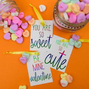 Deco Foil Valentine's Day Tags - I love the look of foil gift tags and never realized how easy it was to do at home! I used my MINC machine and deco foil from Expressions Vinyl to create these candy heart inspired valentines day gift tags!