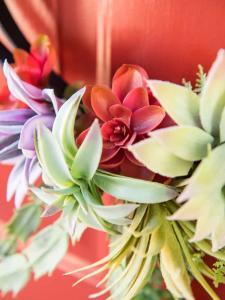 Use fake plants to make a faux succulent wreath for your front door!